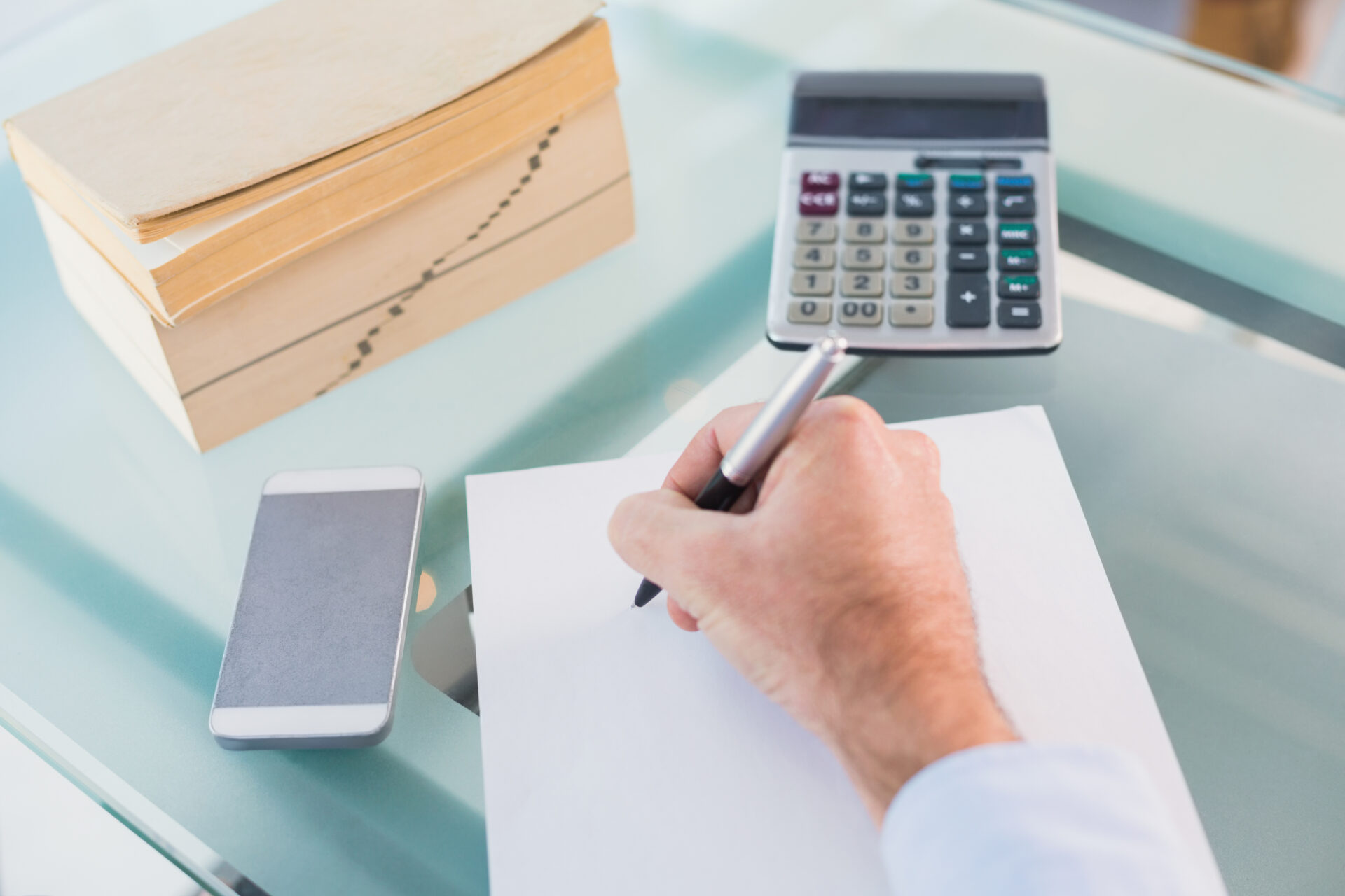 businessman writing paper